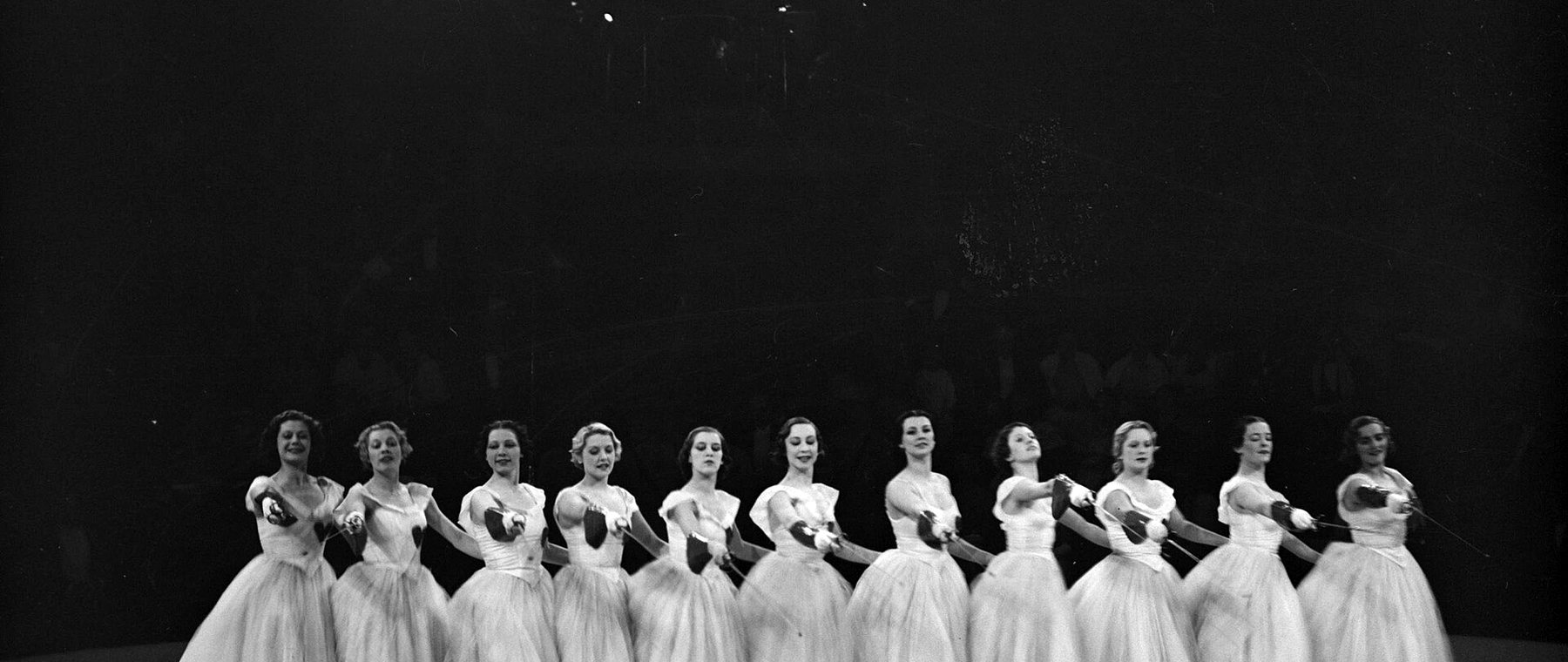 The corps de ballet lined up across the stage