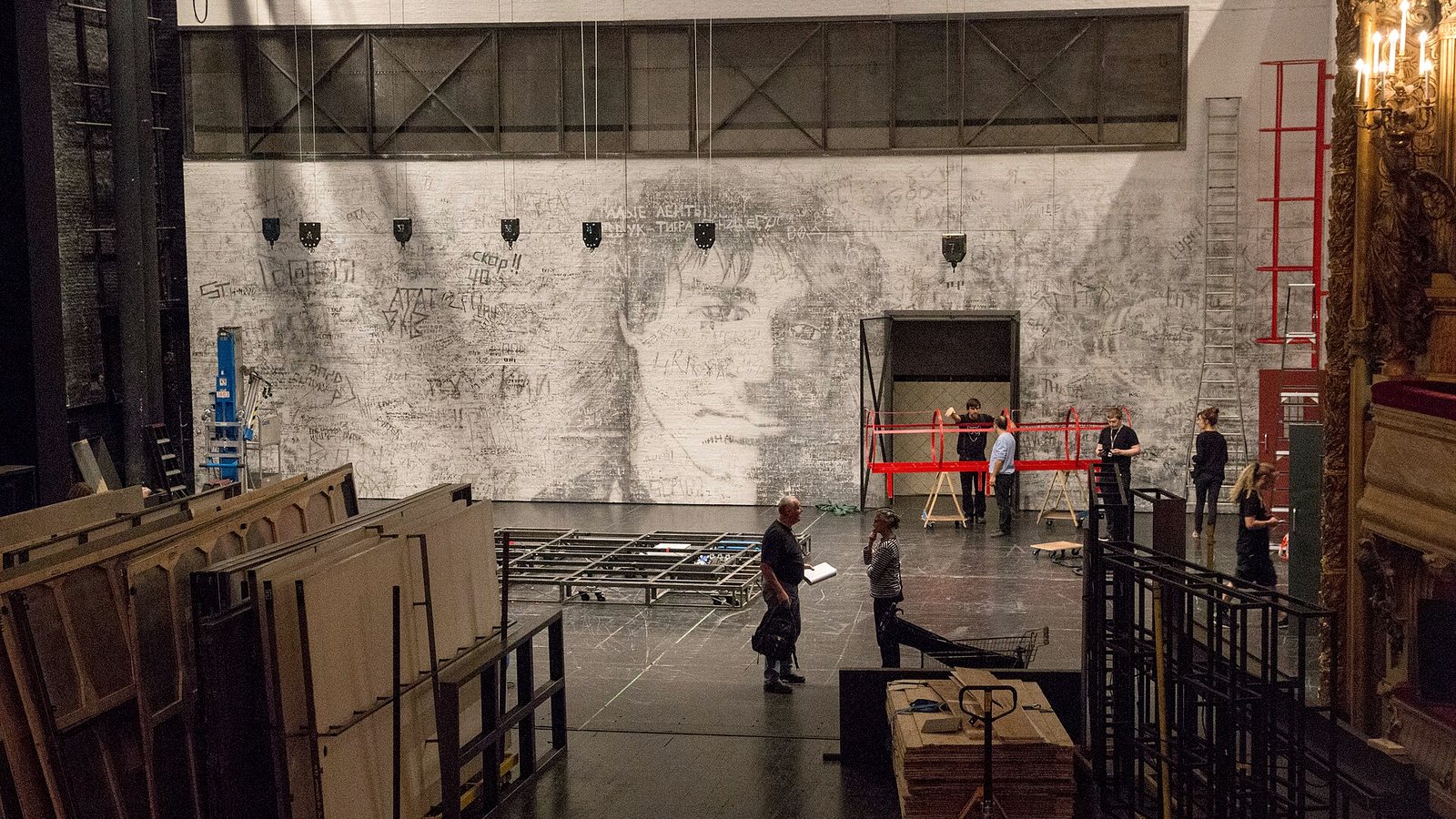 A bare stage in a workshop light