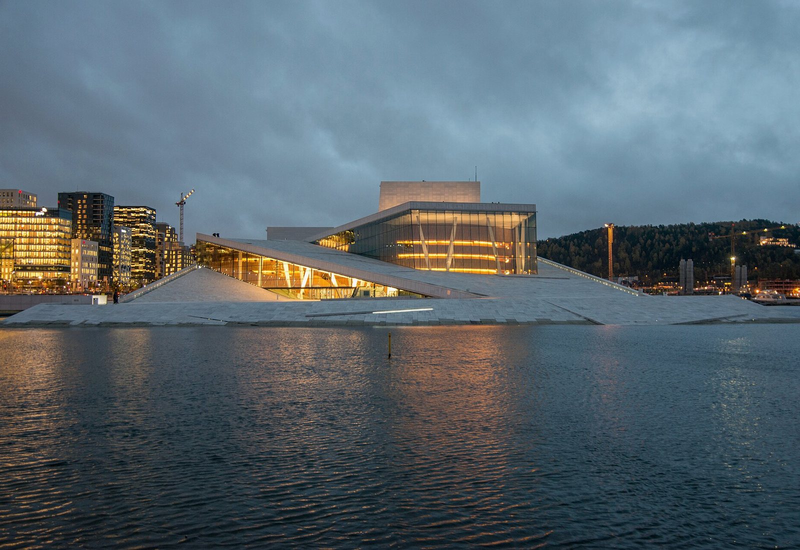 The Oslo Opera House at dusk, seen across the fjord